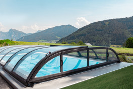 Edelstahlpool Komplettset Infinity® Eternity mit Überlauf-Fertigpool und optional elektrischem Rollo / Poolabdeckung  Poolgröße 3,0 x 5,0m | Überdachung Harmony Clear 3.7x6.3m
