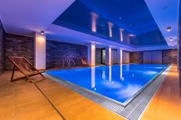 Edelstahlpool Komplettset Infinity® Eternity mit Überlauf-Fertigpool und optional elektrischem Rollo / Poolabdeckung
