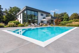 Pool Komplettset Infinity® Bay mit Überlauf-Schwimmbecken und optionaler Poolüberdachung / elektrischem Rollo