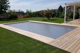 Edelstahlpool Komplettset Infinity® Eternity mit Überlauf-Fertigpool und optional elektrischem Rollo / Poolabdeckung Poolgröße 3,4 x 7,0m | Unterflurrolladen Wand