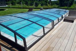 Pool Komplettset Infinity® ONE mit Überlauf-Fertigpool und optional elektrischem Rolladen / Poolabdeckung  Poolgröße 3,0 x 6,0m | Überdachung Liberty 3.5x6.3m