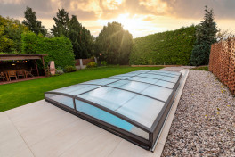 Pool Komplettset Infinity® Bay mit Überlauf-Schwimmbecken und optionaler Poolüberdachung / elektrischem Rollo Poolgröße 3,0 x 7,0m | Überdachung Neo 4.0x7.4m
