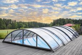 Pool Komplettset Infinity® ONE mit Überlauf-Fertigpool und optional elektrischem Rolladen / Poolabdeckung  Poolgröße 4,0 x 12,0m | Überdachung Base Clear 5.7x12.7m