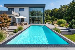 Pool Komplettset Infinity® Bay mit Überlauf-Schwimmbecken und optionaler Poolüberdachung / elektrischem Rollo