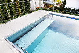 Edelstahlpool Komplettset Eternity® mit Skimmer-Fertigpool und optional elektrischem Rollo / Poolabdeckung  Poolgröße 3,5 x 9,0m | Unterflurrolladen Bank