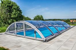 Pool Komplettset Premium ONE® mit Skimmer-Fertigpool und optional elektrischem Rollo / Poolabdeckung  Poolgröße 3,0 x 6,0m | Überdachung Base Clear 3.2x6.3m
