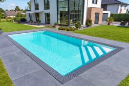 Pool Komplettset Infinity® Bay mit Überlauf-Schwimmbecken und optionaler Poolüberdachung / elektrischem Rollo